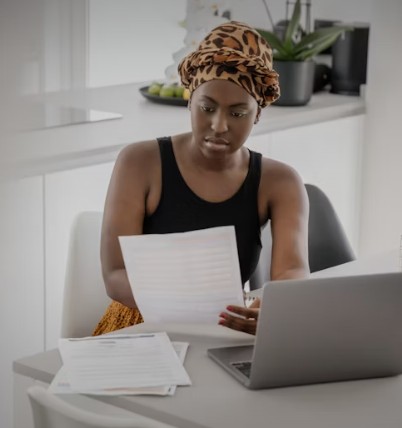 Woman reviewing translation draft before certification at American Translations Sacramento
